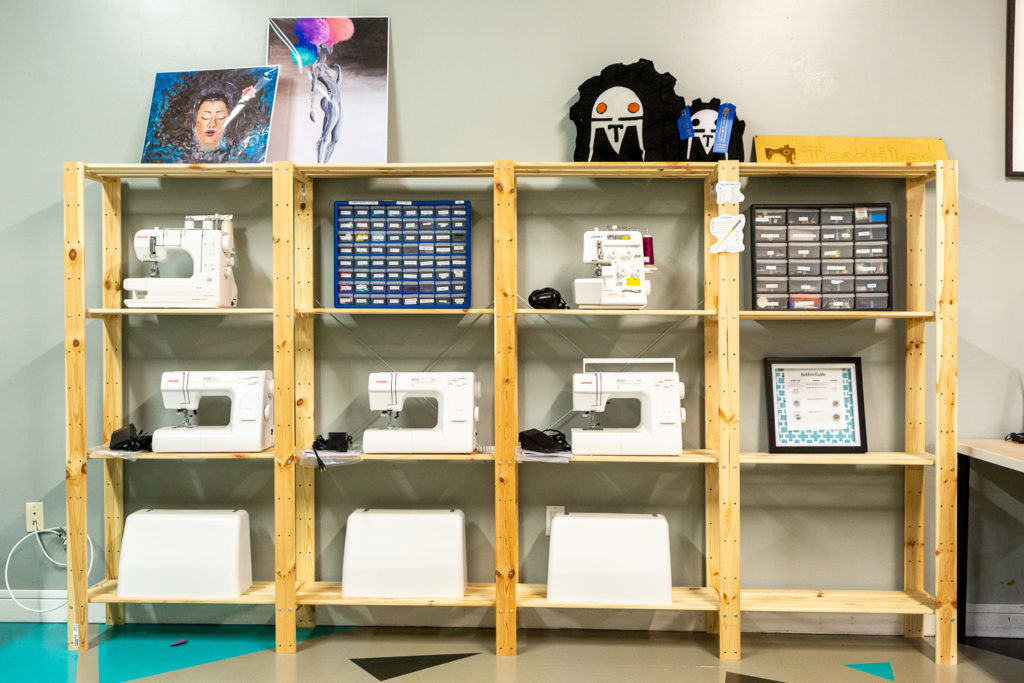 Sewing Machines Stored on Shelves