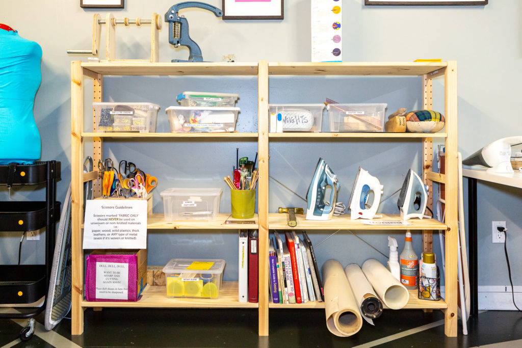 Textile Tool Storage with Irons, scissors, and books