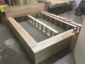 A half completed bed frame
