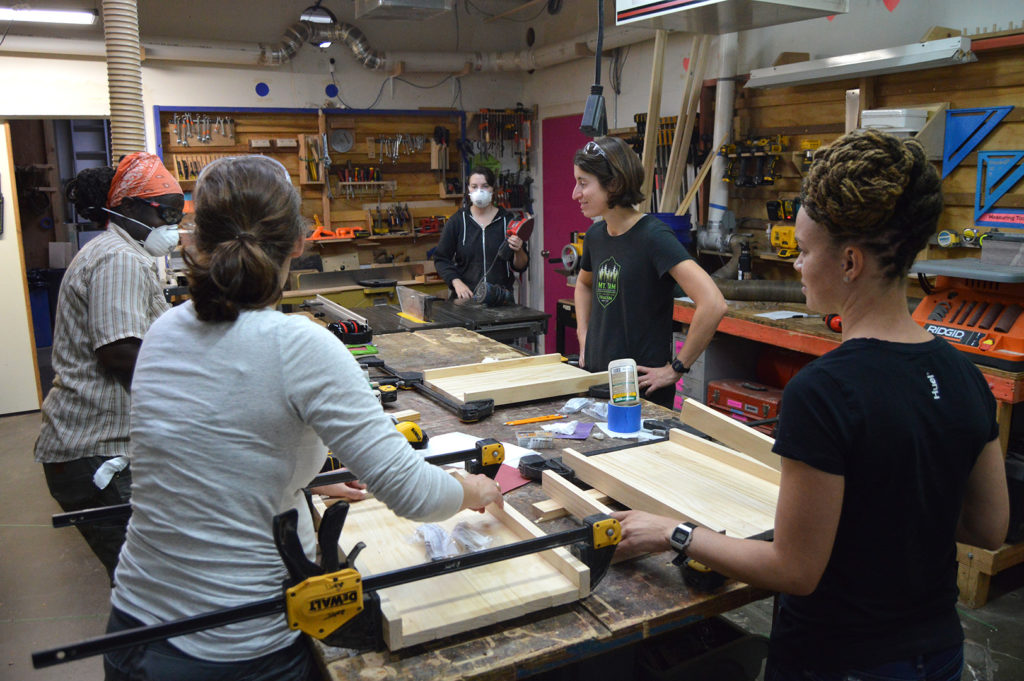 Students making serving trays in the Ace Shop.