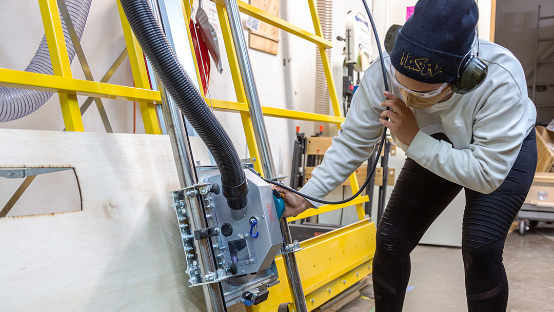 Panel saw, person with beanie