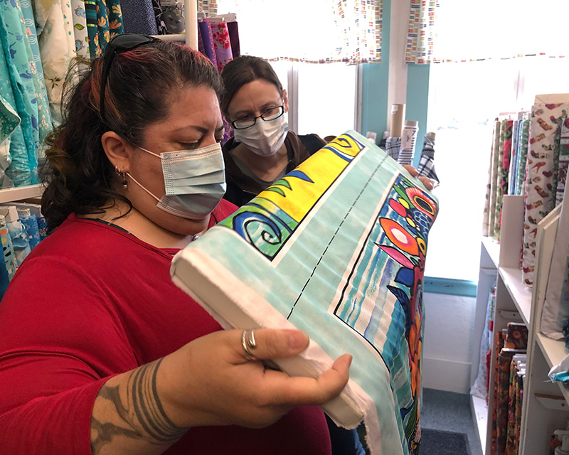 Examining panels of fabric 