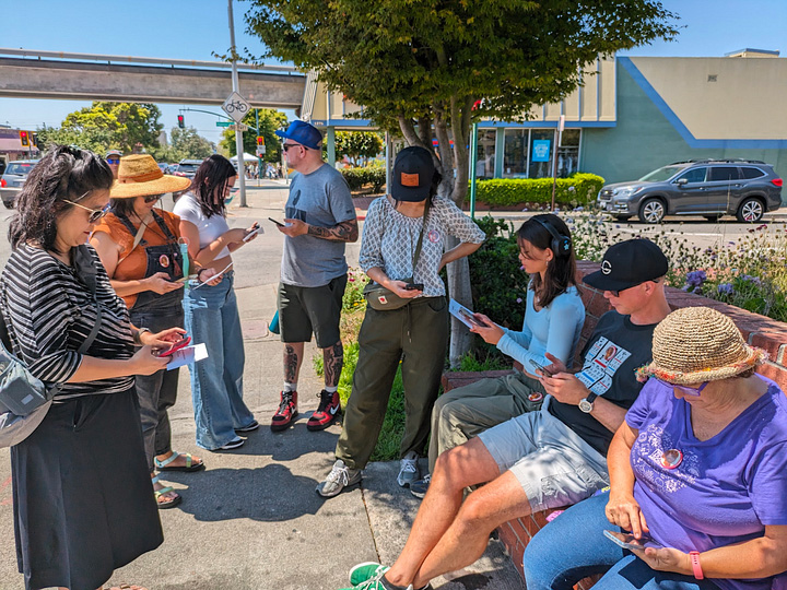 Large group of people on Solano Ave. 