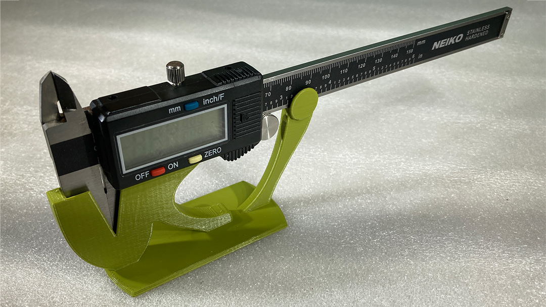 Green caliper stand, calipers