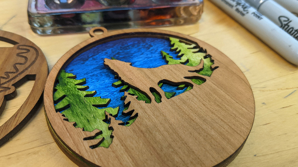 Laser-cut wolf ornament