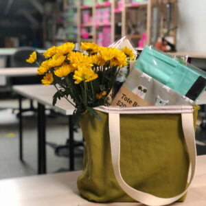 Green tote with yellow flowers
